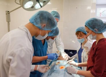 Emergency appendix removal surgery being carried out by a hospital surgical team