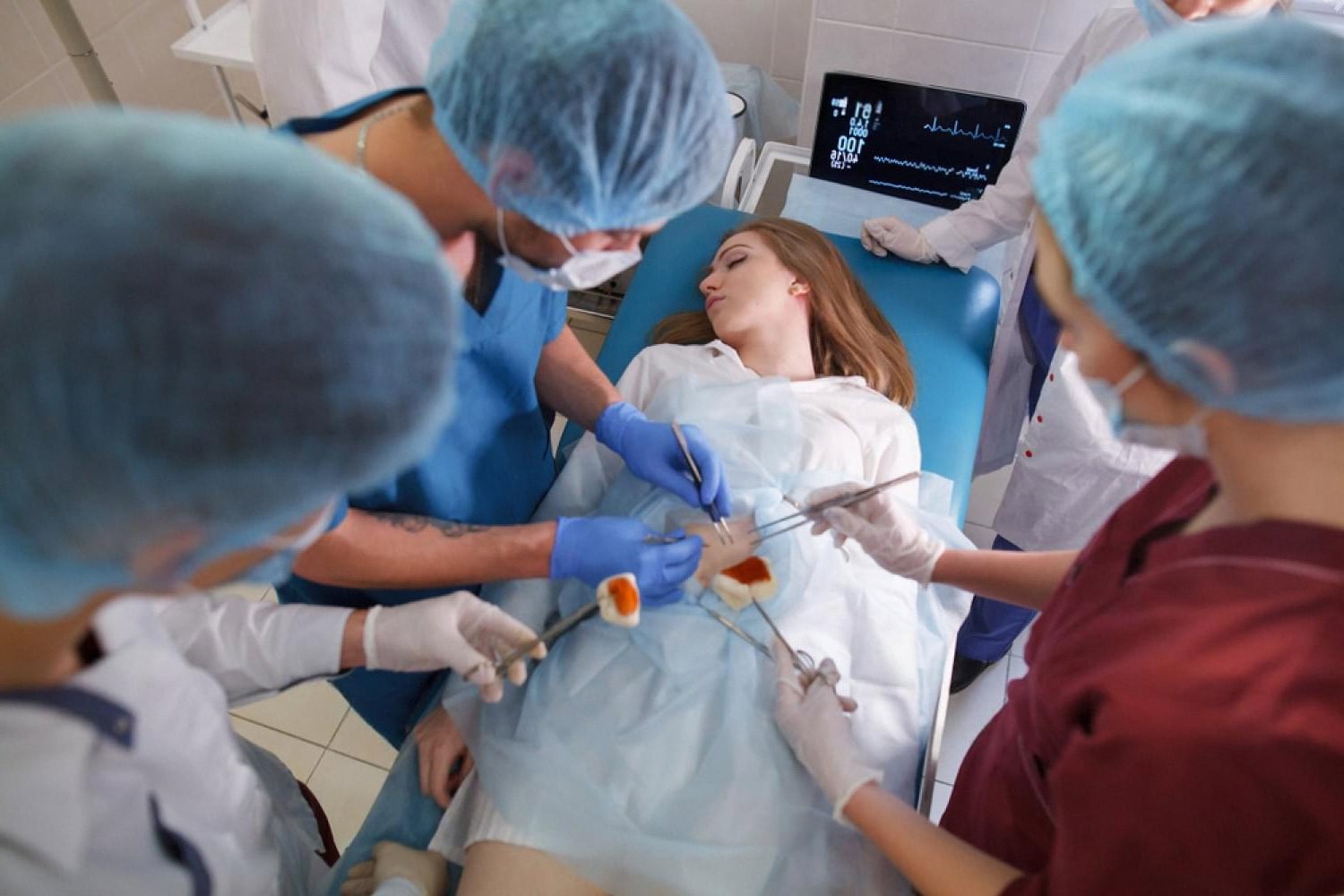 Surgical team performing laparoscopic appendectomy on a patient in a UAE hospital